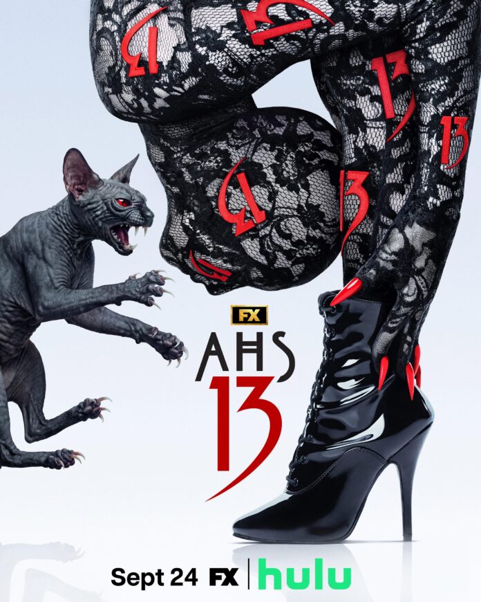 American Horror Story 13 poster featuring a black cat and a woman in a black lace outfit